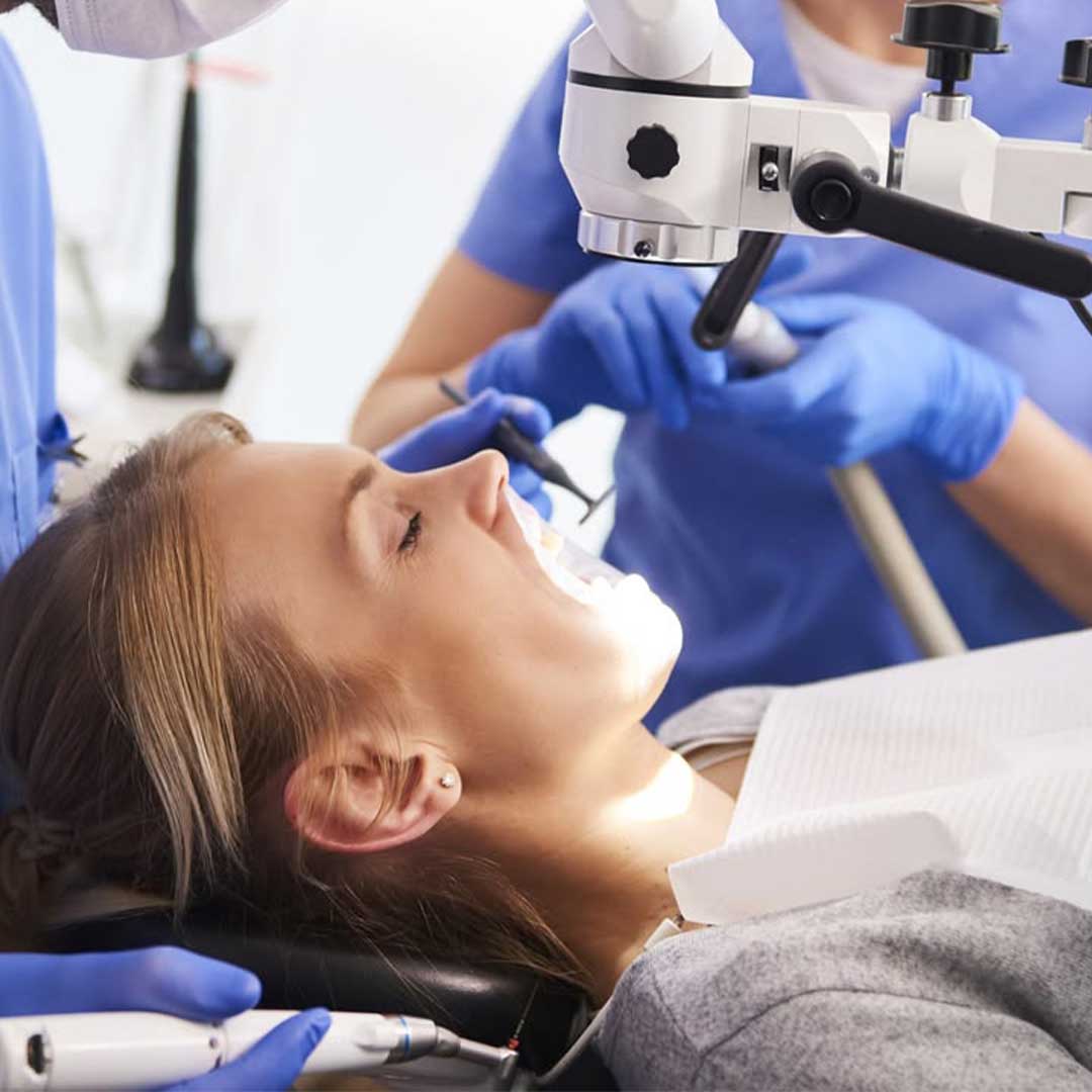 An oral surgeon in San Diego, CA planning a pre-prosthetic surgery using 3D imaging to ensure a comfortable denture fit.